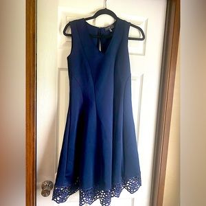 Navy blue woman’s dress. Cocktail dress.
